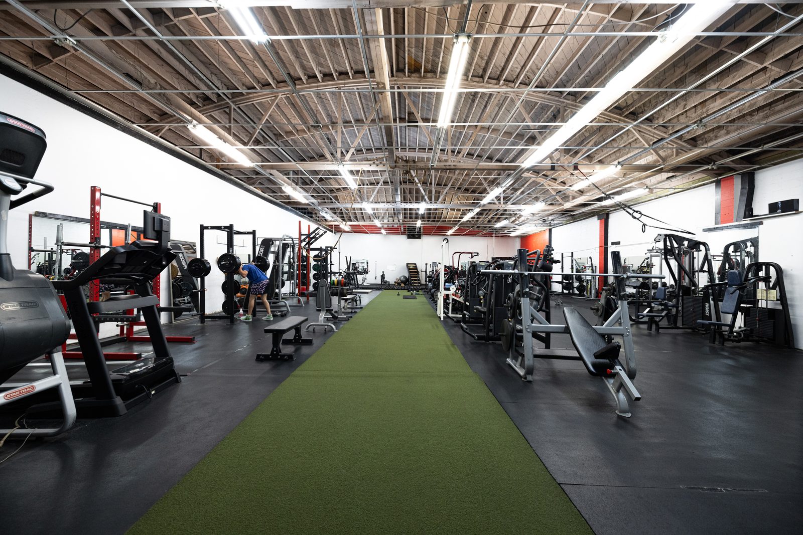 Polo's Gym — full gym overview with turf training lane